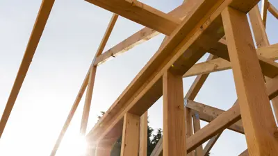 A wooden housing structure being built