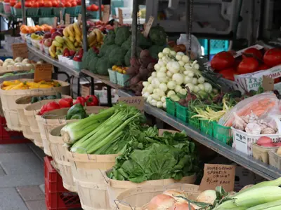 Market stalls showing various vegetables